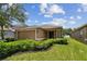 Charming single-story home featuring fresh landscaping and a convenient two-car garage at 8020 Carriage Pointe Dr, Gibsonton, FL 33534