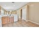 Bright kitchen with a dishwasher and eat in counter, seamlessly connecting to the home's living space at 8020 Carriage Pointe Dr, Gibsonton, FL 33534