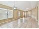Bright and airy living space featuring tile flooring and an open layout at 8020 Carriage Pointe Dr, Gibsonton, FL 33534