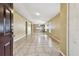 Spacious living area with tile flooring and a bright, open floor plan at 8020 Carriage Pointe Dr, Gibsonton, FL 33534