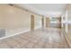 Open-concept living space featuring tile floors and lots of natural light at 8020 Carriage Pointe Dr, Gibsonton, FL 33534