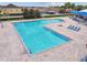 Gorgeous swimming pool and patio area with plenty of seating for residents to enjoy in this community at 8020 Carriage Pointe Dr, Gibsonton, FL 33534