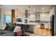 Spacious kitchen featuring a large marble island, modern appliances, and pendant lighting at 824 Lantern Way, Clearwater, FL 33765