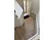 Carpeted staircase leading to the front door, offering a warm welcome to the home at 824 Lantern Way, Clearwater, FL 33765