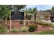 Grand Reserve community sign welcomes residents with lush landscaping and clear directions to the office and clubhouse at 8630 Mallard Reserve Dr # 105, Tampa, FL 33614