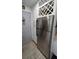 The kitchen has stainless steel appliances, granite countertops, and white cabinetry at 8630 Mallard Reserve Dr # 105, Tampa, FL 33614