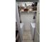 A small laundry room with front-load washer and dryer units side by side in closet at 8630 Mallard Reserve Dr # 105, Tampa, FL 33614