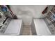 A small laundry room with front-load washer and dryer units side by side in closet at 8630 Mallard Reserve Dr # 105, Tampa, FL 33614