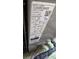 Close-up of the serial number and specs for the home's outdoor air conditioning unit at 8630 Mallard Reserve Dr # 105, Tampa, FL 33614
