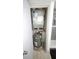 HVAC system and hot water heater in a small utility closet at 8630 Mallard Reserve Dr # 105, Tampa, FL 33614