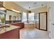 Bright bathroom featuring a soaking tub, walk-in shower, and double vanity with granite countertops at 8704 Winsome Way, Land O Lakes, FL 34637