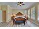 Primary bedroom suite with natural light and a stylish decor at 8704 Winsome Way, Land O Lakes, FL 34637