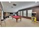 Spacious game room with a pool table, arcade game, and recessed lighting at 8704 Winsome Way, Land O Lakes, FL 34637