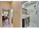 Convenient laundry room with modern appliances and ample storage at 8704 Winsome Way, Land O Lakes, FL 34637
