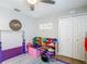 Playroom with storage bins and decorations at 8717 Persea Ct, Trinity, FL 34655
