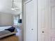 Spacious bedroom featuring hardwood floors, closet and natural light at 8717 Persea Ct, Trinity, FL 34655