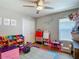 Playroom with storage bins and colorful decor at 8717 Persea Ct, Trinity, FL 34655