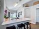 Bright kitchen features white countertops, stainless steel faucet, and modern decor at 8717 Persea Ct, Trinity, FL 34655