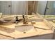 Bathroom sink and large mirror at 880 Mandalay Ave # N311, Clearwater Beach, FL 33767