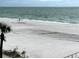 Beautiful beach view featuring tranquil waves and a pristine shoreline for walking at 880 Mandalay Ave # N311, Clearwater Beach, FL 33767