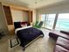Murphy bed with built-ins and balcony access; stylish and space saving design at 880 Mandalay Ave # N311, Clearwater Beach, FL 33767