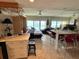 Spacious living area with ocean views, ample seating, and functional layout at 880 Mandalay Ave # N311, Clearwater Beach, FL 33767