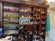 Large closet with shelves holding lots of different high heel shoes of varying colors and styles at 906 Ponce De Leon Blvd, Belleair, FL 33756