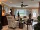 Bright living room with comfortable seating, large windows, and refined furnishings provides a relaxing atmosphere at 906 Ponce De Leon Blvd, Belleair, FL 33756