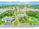Aerial view of community amenities including pools, recreational areas, and lush landscaping at 9790 66Th N St # 37, Pinellas Park, FL 33782