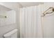 Bathroom with shower curtain and towel rack at 9790 66Th N St # 37, Pinellas Park, FL 33782