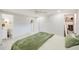Spacious bedroom with closet, ceiling fan and ensuite bath at 9790 66Th N St # 37, Pinellas Park, FL 33782