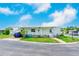 Charming single-story home with carport, well-maintained lawn, and lovely curb appeal at 9790 66Th N St # 37, Pinellas Park, FL 33782