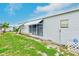 Cozy single-story home featuring awnings and a well-maintained lawn in a sunny community at 9790 66Th N St # 37, Pinellas Park, FL 33782