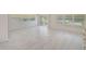 Expansive living room boasts laminate floors, neutral walls, and windows overlooking the outdoors at 9790 66Th N St # 37, Pinellas Park, FL 33782