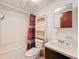 Bathroom featuring a standard tub and vanity at 9910 Jerome Dr, New Port Richey, FL 34654