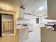 A well-lit kitchen with appliances and tile flooring at 9910 Jerome Dr, New Port Richey, FL 34654