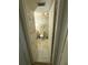 Clean, white, and cozy bathroom with new flooring and modern fixtures at 102 47Th Avenue W Dr # 136, Bradenton, FL 34207