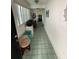 Inviting foyer with tile floors leading to the kitchen and living area at 102 47Th Avenue W Dr # 136, Bradenton, FL 34207