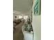 Spacious living room featuring comfortable seating and lots of natural light at 102 47Th Avenue W Dr # 136, Bradenton, FL 34207