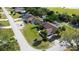 Aerial view featuring neighboring homes with pools and well-maintained lawns in a quiet area at 10365 Lynnhaven Rd, Spring Hill, FL 34608