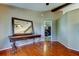 Welcoming foyer featuring hardwood floors and views into another living space at 10365 Lynnhaven Rd, Spring Hill, FL 34608