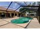 Inviting screened-in pool area with ample seating and space for entertaining at 10365 Lynnhaven Rd, Spring Hill, FL 34608