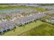 Lakeside community aerial view, featuring townhouses and well-manicured lawns in a desirable neighborhood at 10830 Verawood Dr, Riverview, FL 33579