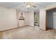 Cozy bedroom features two bright windows with curtains and carpet at 11159 Cindy Dr, Brooksville, FL 34601