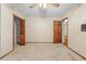 Spacious bedroom featuring a closet, carpet and vintage wallpaper at 11159 Cindy Dr, Brooksville, FL 34601