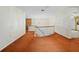 Bright hallway with curved railing, carpet, and chandelier at 11159 Cindy Dr, Brooksville, FL 34601