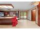 Large kitchen with stainless appliances, island cooktop, and pool view at 11159 Cindy Dr, Brooksville, FL 34601