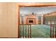 Inviting living room with fireplace and backyard pool access through sliding glass doors at 11159 Cindy Dr, Brooksville, FL 34601