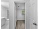 Hallway view of bathroom and bedroom at 1116 Jadewood Ave, Clearwater, FL 33759