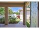 Well-maintained backyard with a manicured lawn, garden, and a separate outbuilding or shed at 1119 Highland S St, St Petersburg, FL 33701